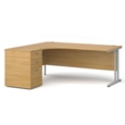 Maestro 25 left hand ergonomic desk 1800mm with silver cantilever frame and desk high pedestal - oak