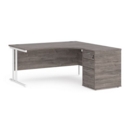 Maestro 25 right hand ergonomic desk 1600mm with white cantilever frame and desk high pedestal - grey oak