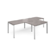 Adapt double straight desks 2800mm x 800mm with 800mm return desks - white frame and grey oak top