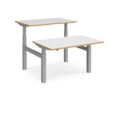 Elev8 Touch sit-stand back-to-back desks 1200mm x 1650mm - silver frame and white top with oak edge