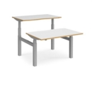 Elev8 Touch sit-stand back-to-back desks 1200mm x 1650mm - silver frame and white top with oak edge