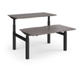 Elev8 Touch sit-stand back-to-back desks 1400mm x 1650mm - black frame and grey oak top