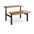 Elev8 Touch sit-stand back-to-back desks 1400mm x 1650mm - black frame and oak top