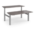 Elev8 Touch sit-stand back-to-back desks 1600mm x 1650mm - silver frame and grey oak top