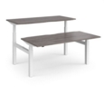 Elev8 Touch sit-stand back-to-back desks 1600mm x 1650mm - white frame and grey oak top