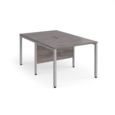 Maestro 25 back to back straight desks 1000mm x 1600mm - silver bench leg frame and grey oak top