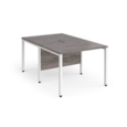 Maestro 25 back to back straight desks 1000mm x 1600mm - white bench leg frame and grey oak top