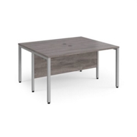 Maestro 25 back to back straight desks 1400mm x 1200mm - silver bench leg frame and grey oak top