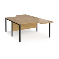 Maestro 25 back to back ergonomic desks 1400mm deep - black bench leg frame and oak top