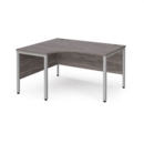 Maestro 25 left hand ergonomic desk 1400mm wide - silver bench leg frame and grey oak top