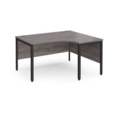 Maestro 25 right hand ergonomic desk 1400mm wide - black bench leg frame and grey oak top