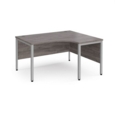 Maestro 25 right hand ergonomic desk 1400mm wide - silver bench leg frame and grey oak top