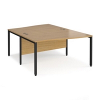 Maestro 25 back to back wave desks 1400mm deep - black bench leg frame and oak top