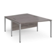Maestro 25 back to back wave desks 1400mm deep - silver bench leg frame and grey oak top