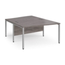 Maestro 25 back to back wave desks 1400mm deep - silver bench leg frame and grey oak top