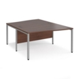 Maestro 25 back to back wave desks 1400mm deep - silver bench leg frame and walnut top