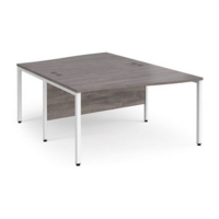 Maestro 25 back to back wave desks 1400mm deep - white bench leg frame and grey oak top