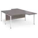 Maestro 25 back to back ergonomic desks 1600mm deep - white bench leg frame and grey oak top