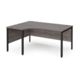 Maestro 25 left hand ergonomic desk 1600mm wide - black bench leg frame and grey oak top