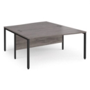 Maestro 25 back to back wave desks 1600mm deep - black bench leg frame and grey oak top