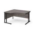 Maestro 25 left hand ergonomic desk 1400mm wide - black cantilever leg frame and grey oak top