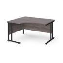 Maestro 25 left hand ergonomic desk 1400mm wide - black cantilever leg frame and grey oak top
