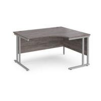Maestro 25 right hand ergonomic desk 1400mm wide - silver cantilever leg frame and grey oak top