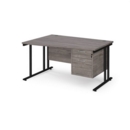 Maestro 25 left hand wave desk 1400mm wide with 2 drawer pedestal - black cantilever leg frame and grey oak top
