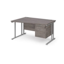 Maestro 25 left hand wave desk 1400mm wide with 2 drawer pedestal - silver cantilever leg frame and grey oak top