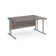Maestro 25 right hand wave desk 1400mm wide - silver cantilever leg frame and grey oak top