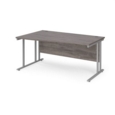 Maestro 25 left hand wave desk 1600mm wide - silver cantilever leg frame and grey oak top