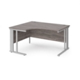 Maestro 25 left hand ergonomic desk 1400mm wide - silver cable managed leg frame and grey oak top