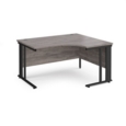 Maestro 25 right hand ergonomic desk 1400mm wide - black cable managed leg frame and grey oak top