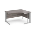 Maestro 25 right hand ergonomic desk 1400mm wide - silver cable managed leg frame and grey oak top