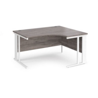 Maestro 25 right hand ergonomic desk 1400mm wide - white cable managed leg frame and grey oak top