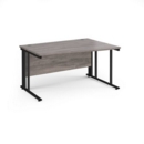 Maestro 25 right hand wave desk 1400mm wide - black cable managed leg frame and grey oak top