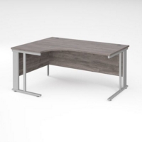 Maestro 25 left hand ergonomic desk 1600mm wide - silver cable managed leg frame and grey oak top