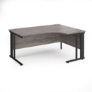 Maestro 25 right hand ergonomic desk 1600mm wide - black cable managed leg frame and grey oak top
