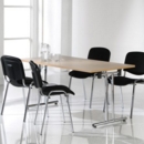 Rectangular folding leg table with black legs and straight foot rails 1800mm x 800mm - oak