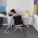 Sway black mesh back adjustable operator chair with black fabric seat and grey frame and base